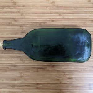 New cheese plate made from glass wine bottle